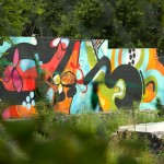 hense mural through fence - photo by: ryan sterritt