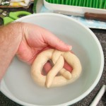 dip pretzel into baking soda liquid - photo by: ryan sterritt