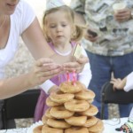 lighting the cake - photo by: ryan sterritt