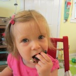 clementine enjoying her first oreo - photo by: ryan sterritt