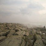 rocky beach near cape elizabeth lighthouse - photo by: ryan sterritt