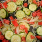 sautéed zucchini with onion & tomato - photo by: ryan sterritt