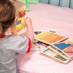 playing with her books - photo by: ryan sterritt