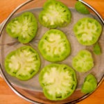 green tomatoes on splash guard - photo by: ryan sterritt